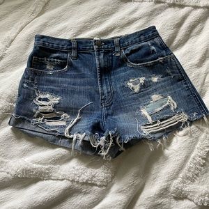 Distressed mid rise denim shorts